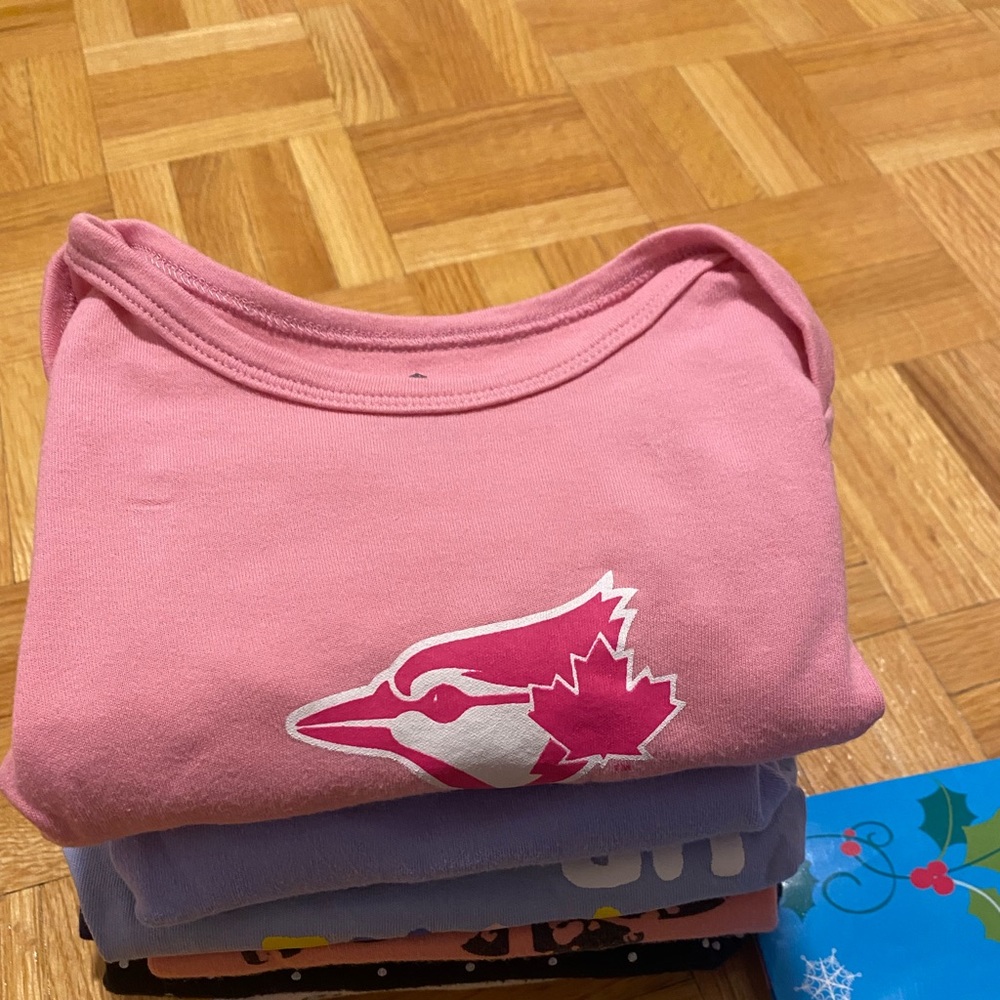 Assorted onesies and shirts - 7 included.